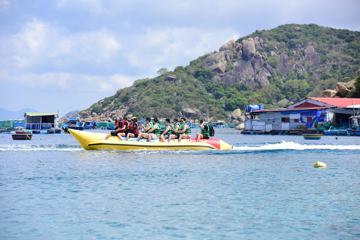Jet ski resting on calm turquoise water at Galu Beach